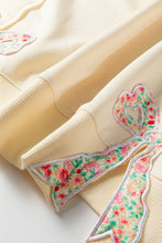 Load image into Gallery viewer, Beige Plus Size Raw Seam Detail Floral Bow Patched Baggy Pullover