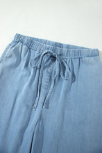 Load image into Gallery viewer, Dusk Blue Ruffled Hem Wide Leg Chambray Pants