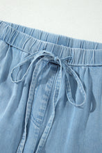 Load image into Gallery viewer, Dusk Blue Ruffled Hem Wide Leg Chambray Pants